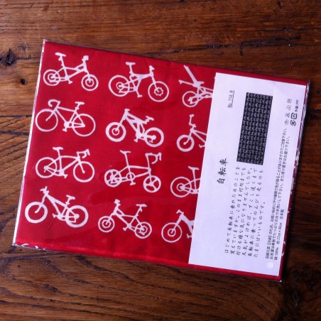 Foulard motif Bicyclettes fond rouge.